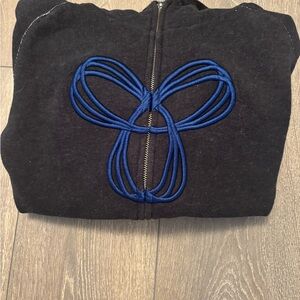 Black TNA Zip-Up with Blue Embroidery
